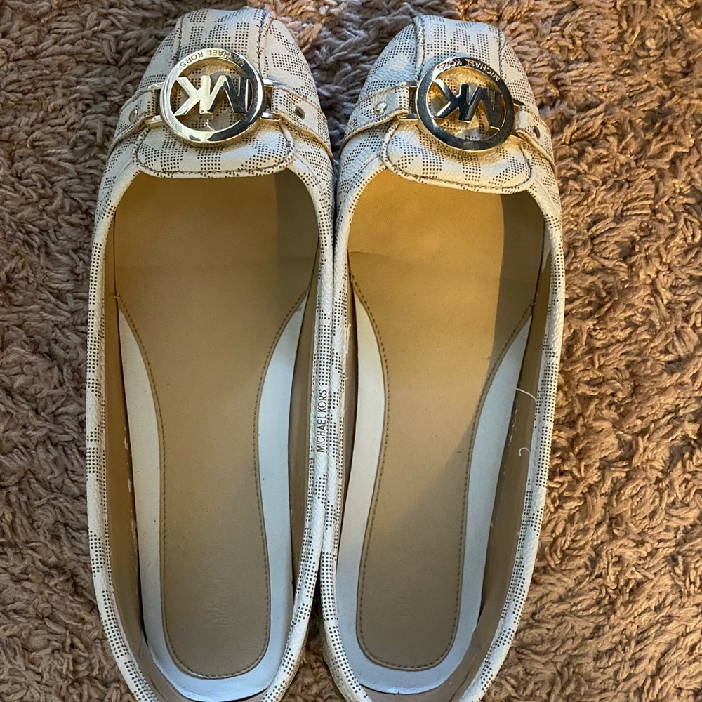 Michael Kors flats. Lightly worn. Size 9.5